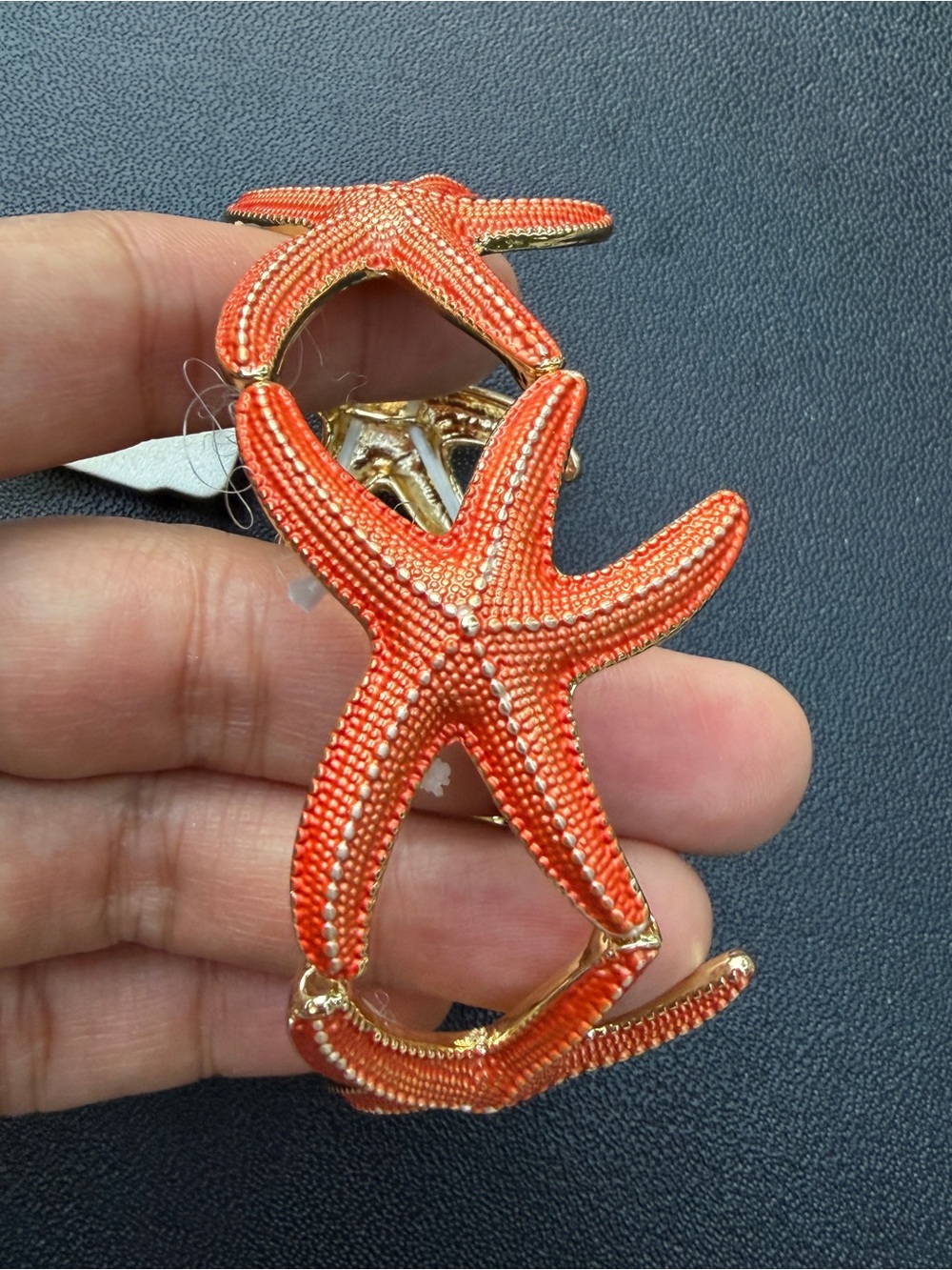 New with tag orange star fish metal bracelet elastic